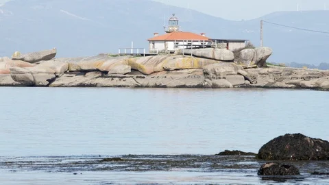 Marine landscape with lighthouse on rocks 스톡 동영상 103726543