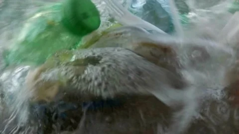 Marine plastic pollution Garbage in ocean. 動画素材 334660371
