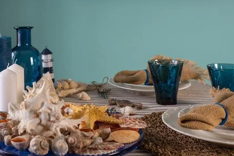 Marine style in the interior, table setting in a sea style Stock Photos