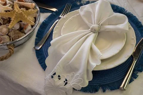 Marine style in the interior, table setting in a sea style Stock Photos