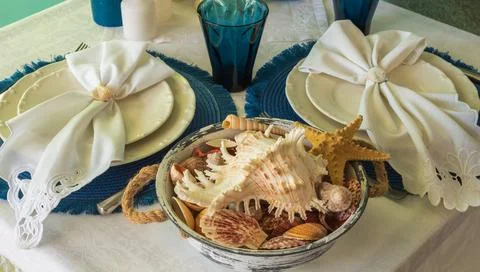Marine style in the interior, table setting in a sea style Stock Photos
