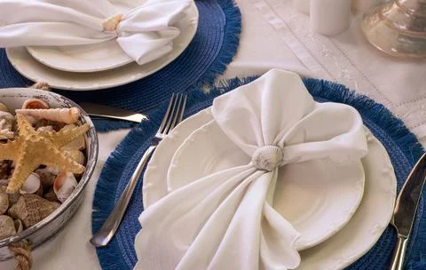 Marine style in the interior, table setting in a sea style Stock Photos