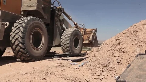 Marines Heavy equipment operating at Forward Operating Base Whitehouse - 2012 Stock Footage 104299159