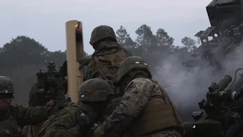 Marines loading M777 Howitzer Stock Footage 87168699