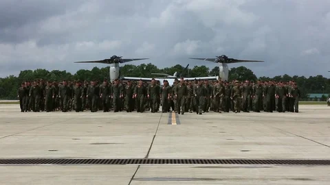 Marines march in front of MV-22 on their return from deployment 스톡 동영상 93392455