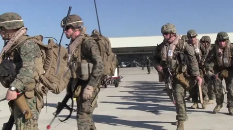 Marines Prepare to Board USMC Ospry Tilt-Rotor Helicopter Video stock 56440146