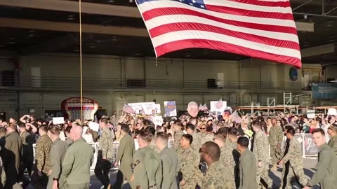 Marines returning home from deployment to reunite with their waiting families Stock Footage 293684925