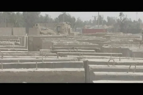 Marines using heavy equipment to distribute barricade at champ Fallujah - 2008 Vídeo Stock 108263483