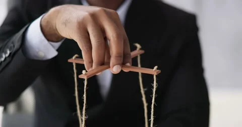 Marionette Manipulation With Hand Holding Puppet Stock Footage 230062914