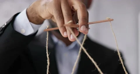 Marionette Manipulation With Hand Holding Puppet Stock Footage 230062947
