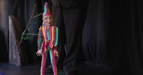 A marionette performs at show outdoors Stock Footage 242532114