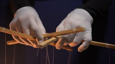 A marionette, a puppet controlled from above using wires or strings Stock Footage 112926123