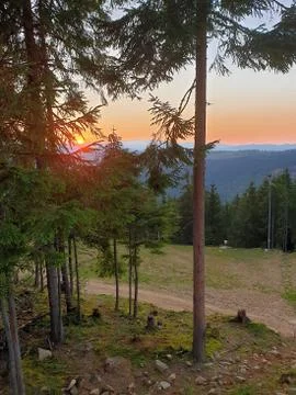 Marisel ski slope in summer at sunset, Romania Stock Photos