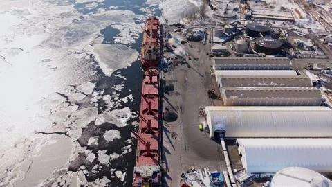Maritime cargo operations in icy harbor canada winter Stock Footage 329452430