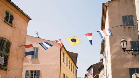 Maritime flags blowing in slow motion in St. Tropez city Stock Footage 101650642