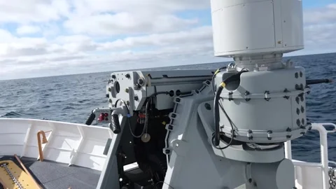 Mark 38 25mm machine gun system rotating aboard USCGC Melvin Bell Stock Footage 266248612