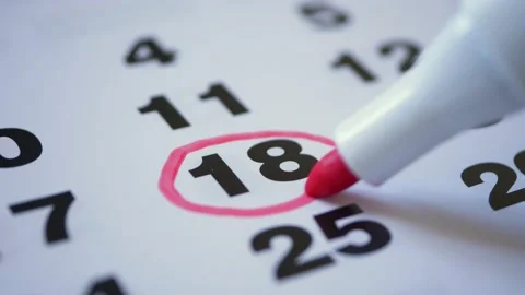 Mark on the calendar at 18. Save the date. Stock Footage 155154805