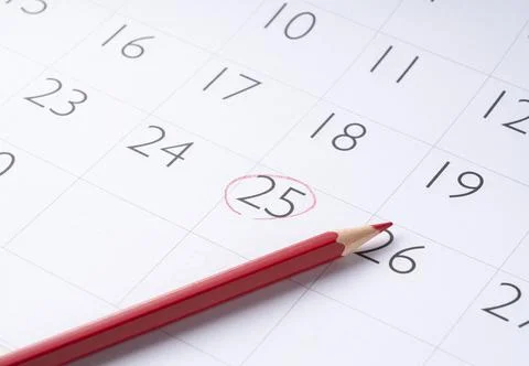 Mark your calendar with a red pencil. Stock Photos