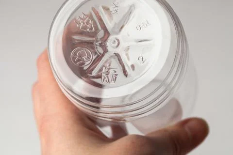 Marked bottom of a plastic transparent bottle Stock Photos