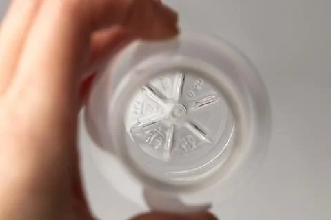 Marked bottom of a plastic transparent bottle Stock Photos