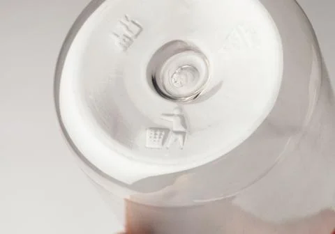 Marked bottom of a plastic transparent bottle Stock Photos