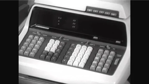 A marked card reader, an X-Y plotter and an equation are shown in a Stock Footage 92631855