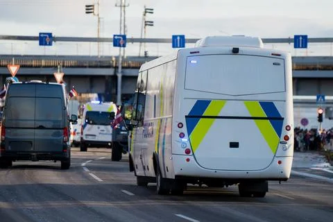 Marked convoy van with reflective graphics and blue emergency lights Stock Photos