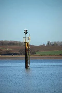 Marker beacon in river Stock Photos