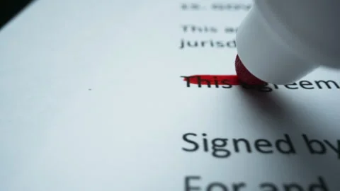 Marker drawing straight line on paper. Person editing document with marker Stock Footage 138517005