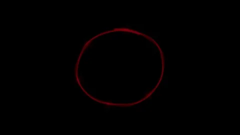 Marker highlight stroke. Glowing red marker circle highlight on black Stock Footage 342204116