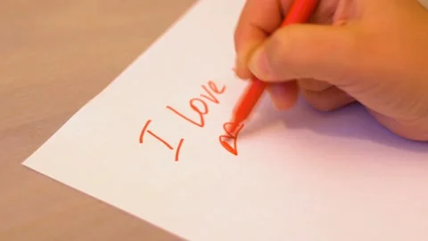Marker write a Declaration of love and draw lips 4K Stock Footage 102636406