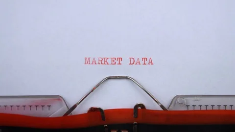 Market data - phrase printed on an old typewriter in red letters, close up. Stock Footage 129535002