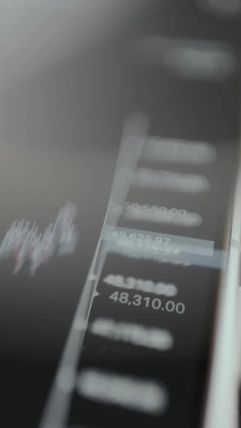 Market prices on a candlestick chart, view through eyeglasses Stock Footage 329773893