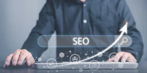 Marketer showing SEO concept through virtual icons , optimization analysis .. Stock Photos