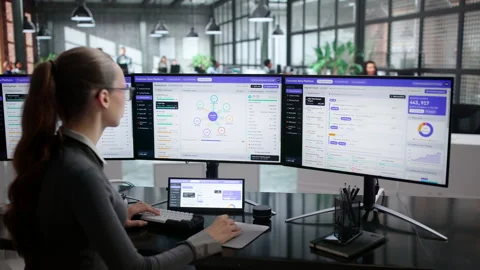Marketing Analyst Studies Customer Data On Computer 動画素材 345859183