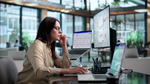 Marketing Manager Analyzes Campaign Data With Software Dashboard Stock Footage 337639426