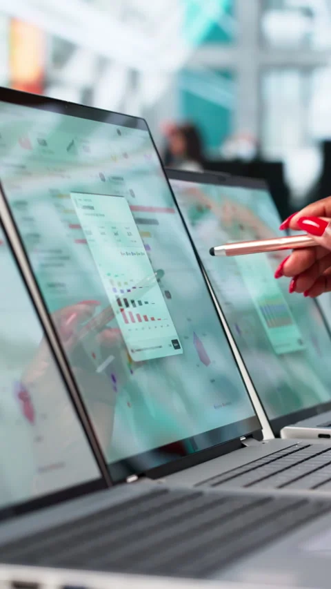 Marketing Manager Analyzes Campaign Data On Laptop Video stock 337646493
