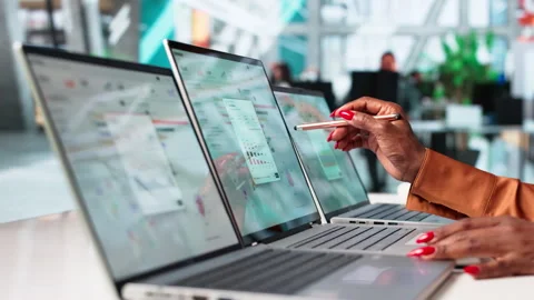 Marketing Manager Analyzes Campaign Data On Laptop Stock Footage 339184055