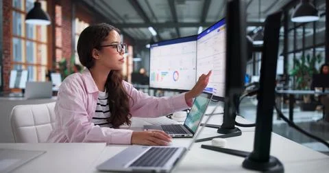 Marketing Manager Analyzes Customer Data Using CRM Software On Laptop. Stock-Fotos