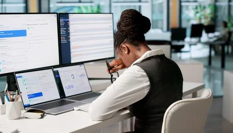Marketing Manager Frustratedly Solves Client Email Issues On Laptop Screen. Stock Photos