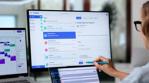 Marketing Manager Using Laptop To Send Secure Bulk Emails Stock Footage 347290460