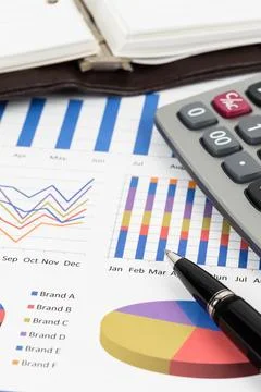 Marketing report chart with graph analysis Stock Photos