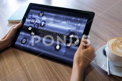 Marketing strategy diagram on device screen. Business concept. Stock Photos