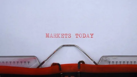 Markets today - phrase printed on an old typewriter in red letters, close up. Stock Footage 129534881