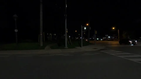 Markham, Canada, May 31 2025 POV side view driving on very dark night in city Stock Footage 309535488