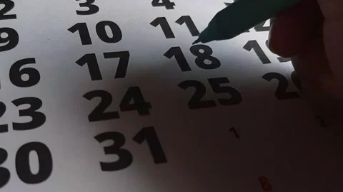 Marking the 18th on the calendar	 Stock Footage 285917103