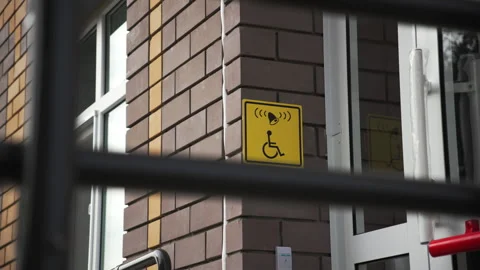 Marking above staff call button to assist people with low mobility Stock Footage 293304212