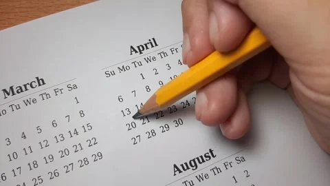 Marking April 20 date on the calendar Stock Footage 303991845