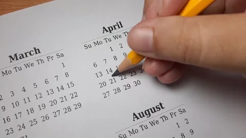 Marking april date on the calendar Video stock 296143637