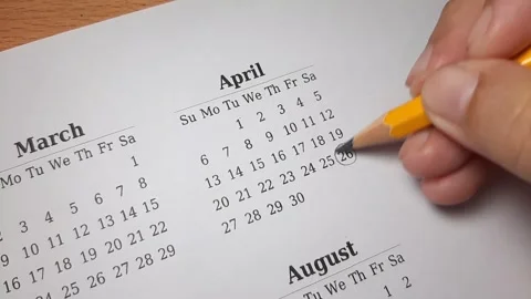 Marking april date on the calendar Video stock 296143639